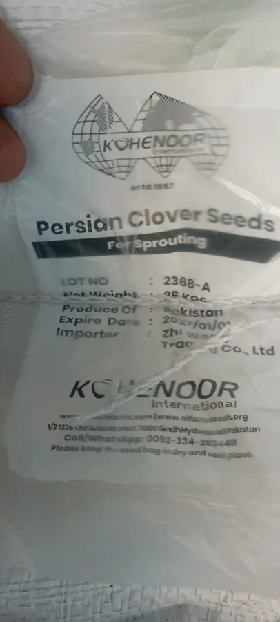 Container being sealed after seed loading